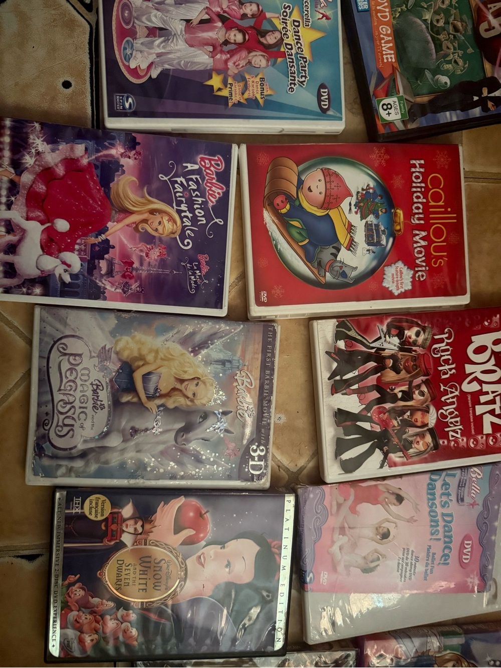 Assorted Kids DVD Lot - Barbie, Bratz, Caillou